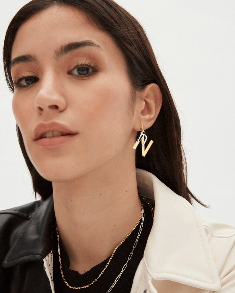 Silver, gold letter earring letra N