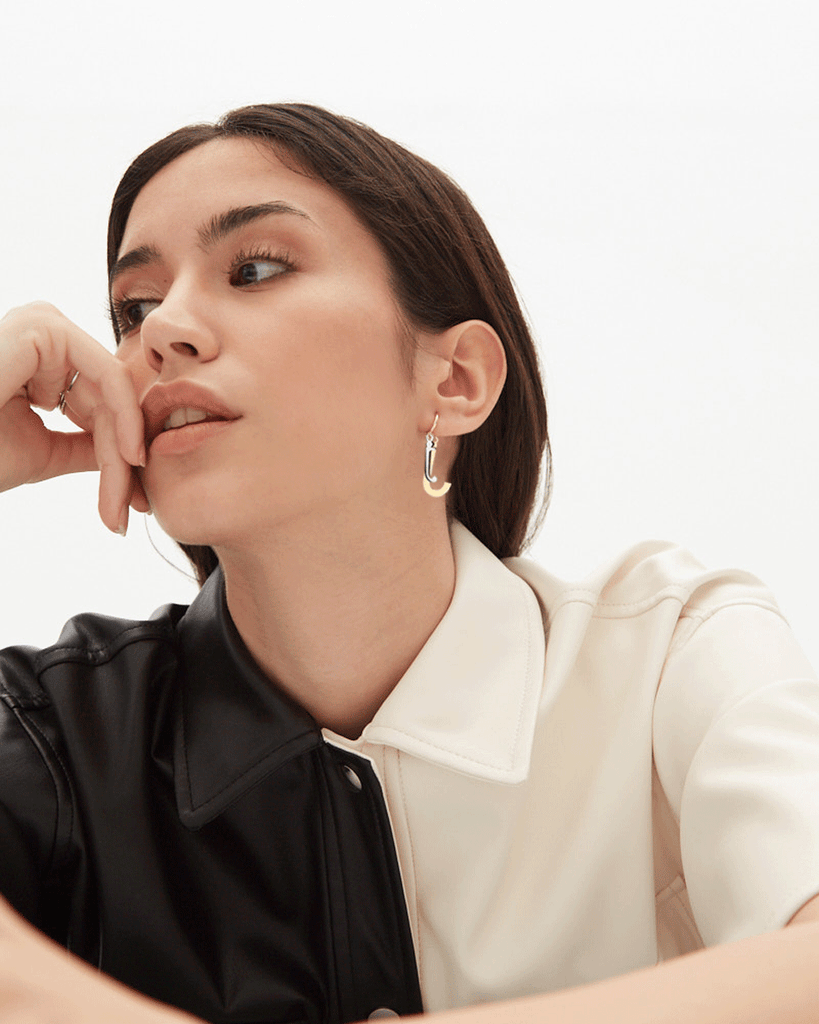 Silver, gold letter earring letra J