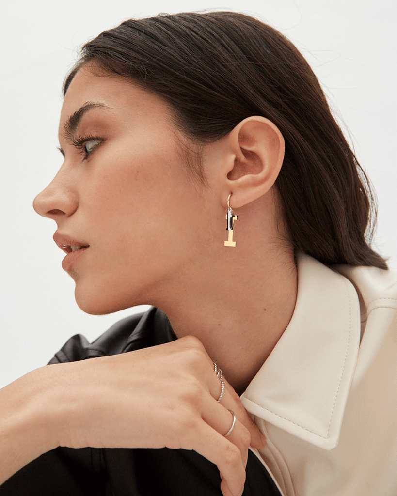 Silver, gold letter earring letra I