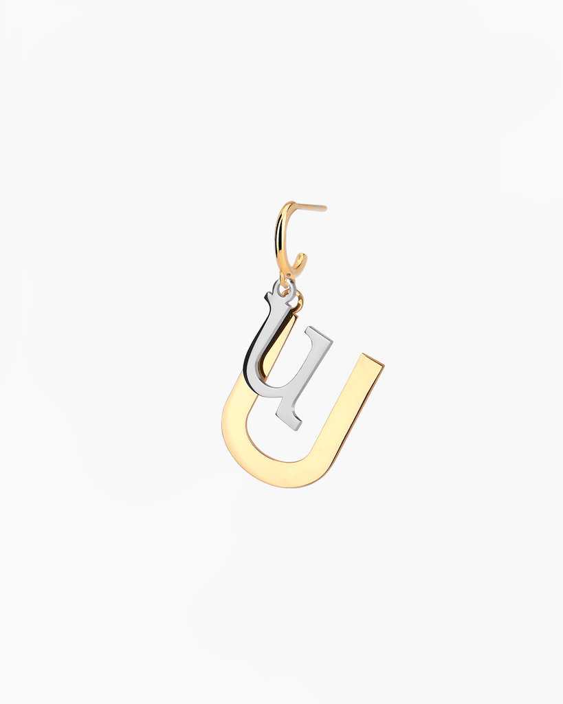 Silver, gold letter earring letra U