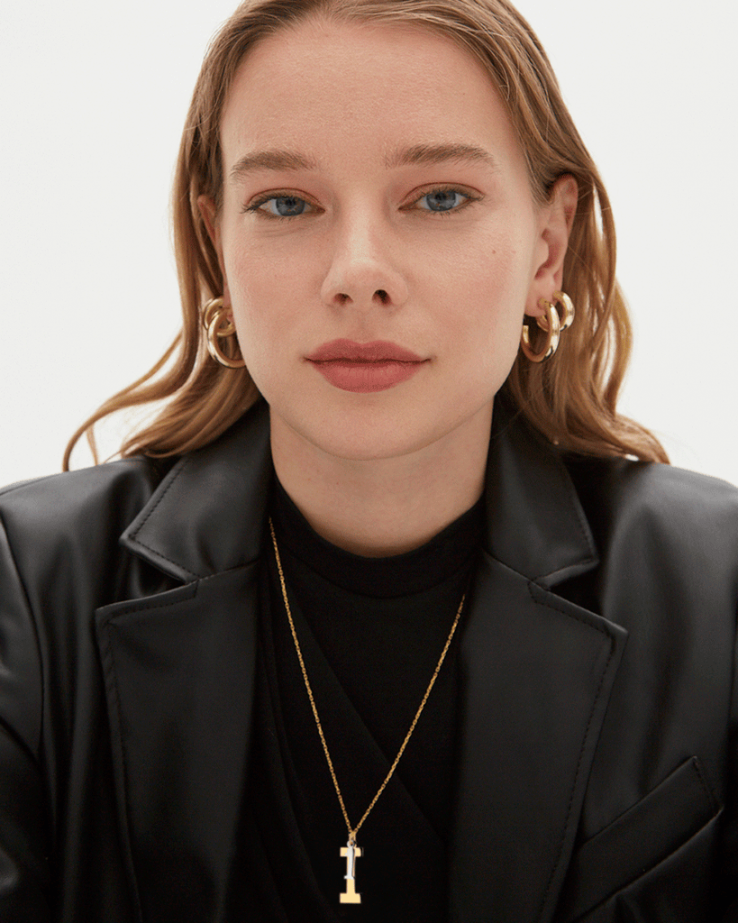 Silver, gold letter necklace letra I