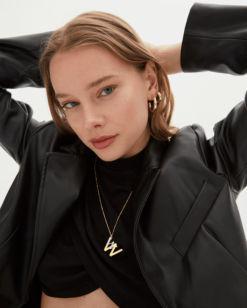 Silver, gold letter necklace letra W