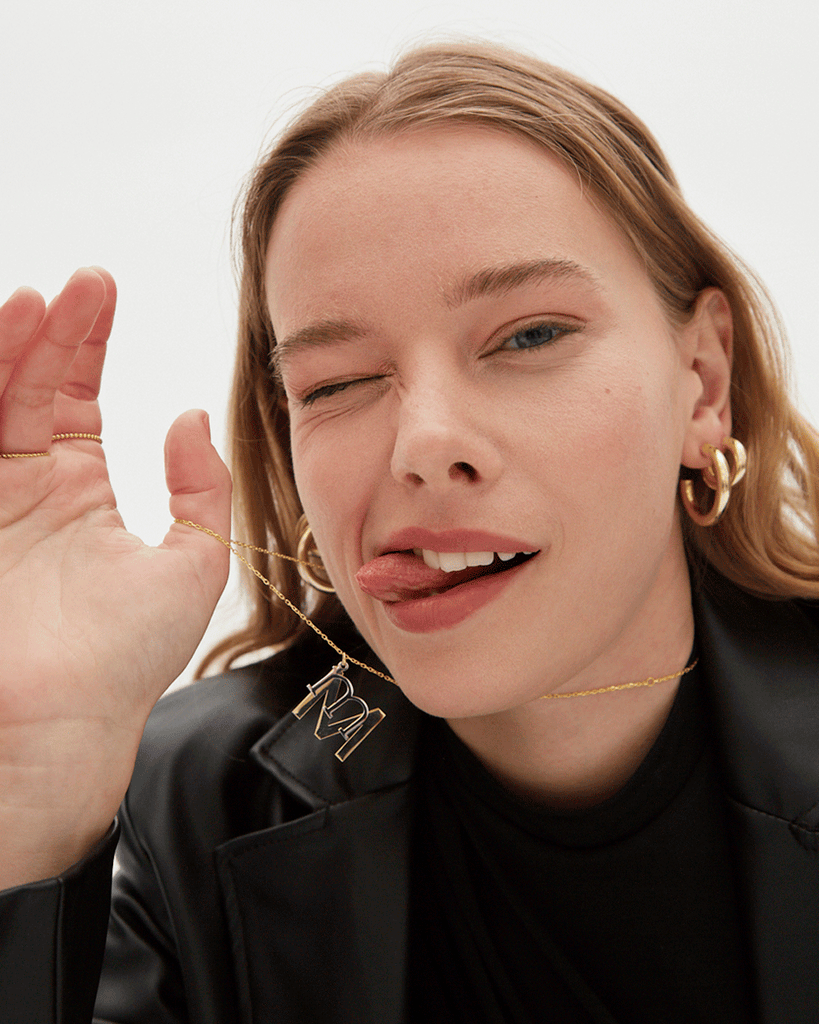 Silver, gold letter necklace letra M