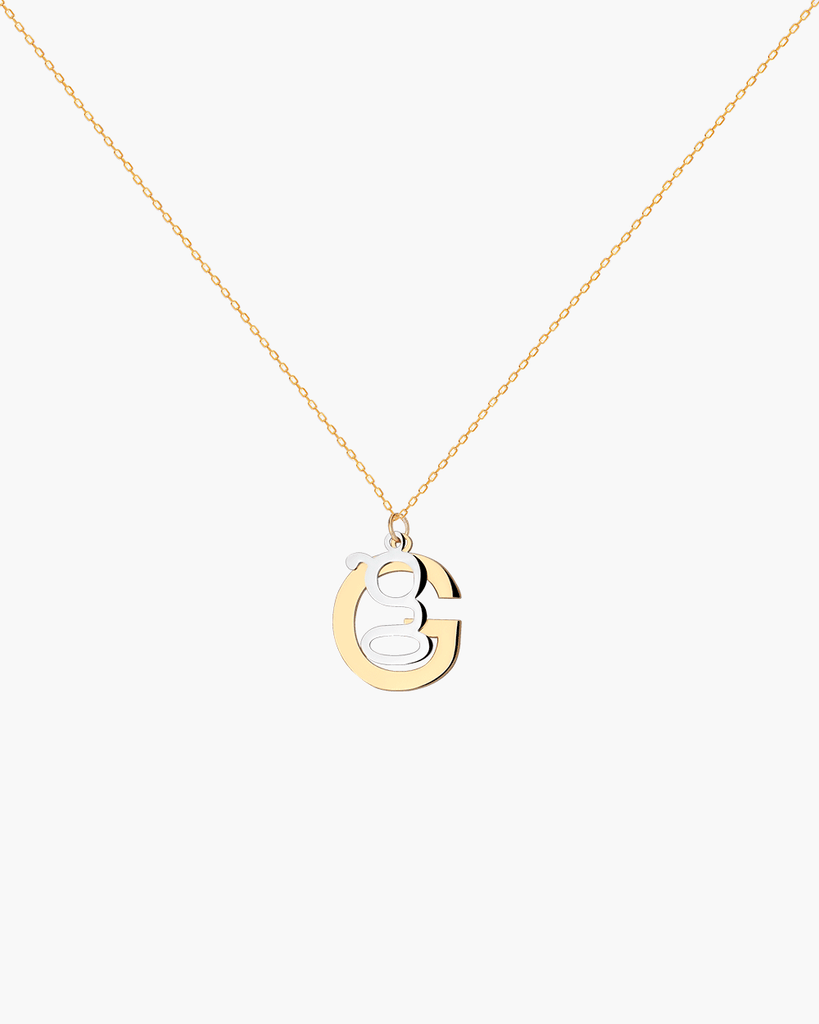 Silver, gold letter necklace letra G