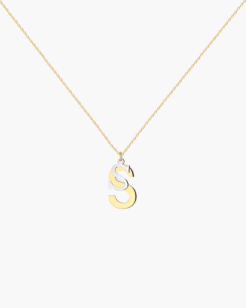 Silver, gold letter necklace letra S