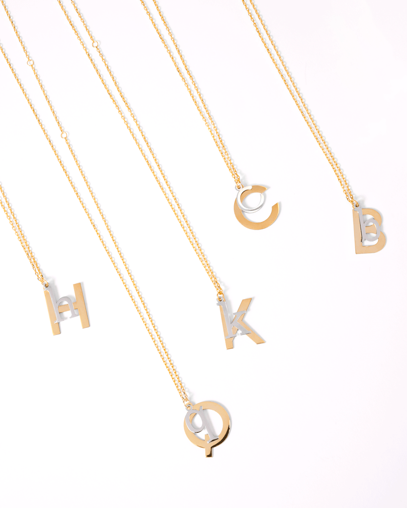 Silver, gold letter necklace letra h q k c b
