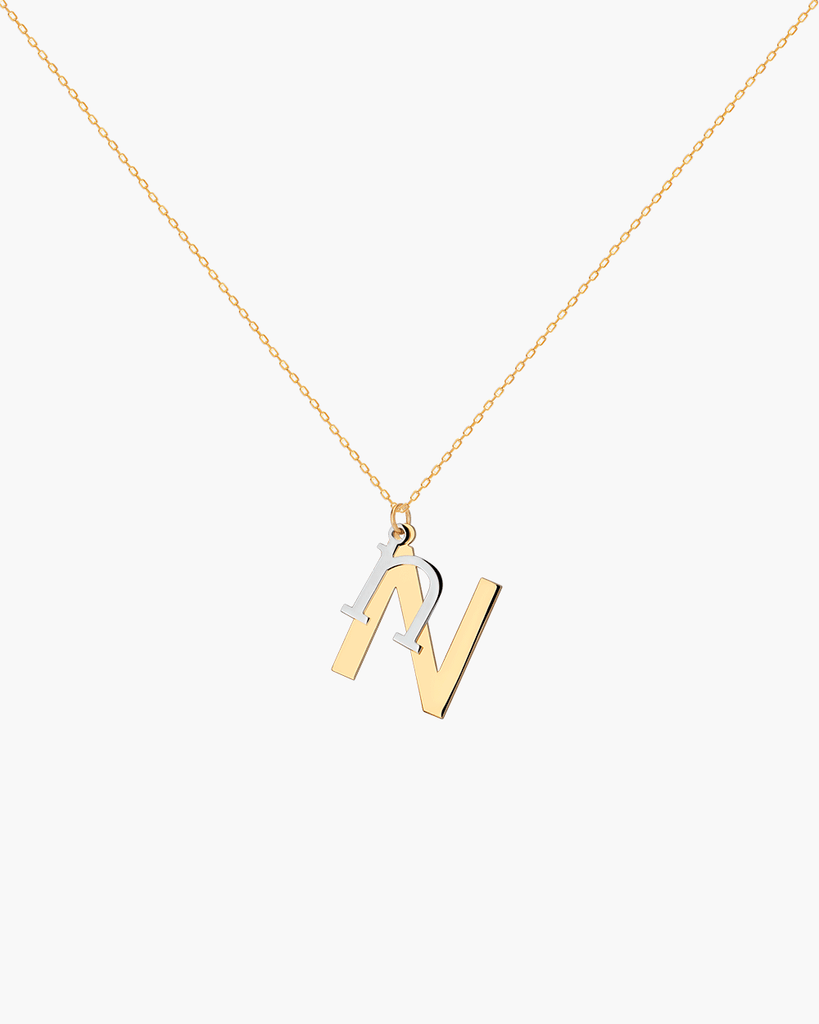 Silver, gold letter necklace letra N