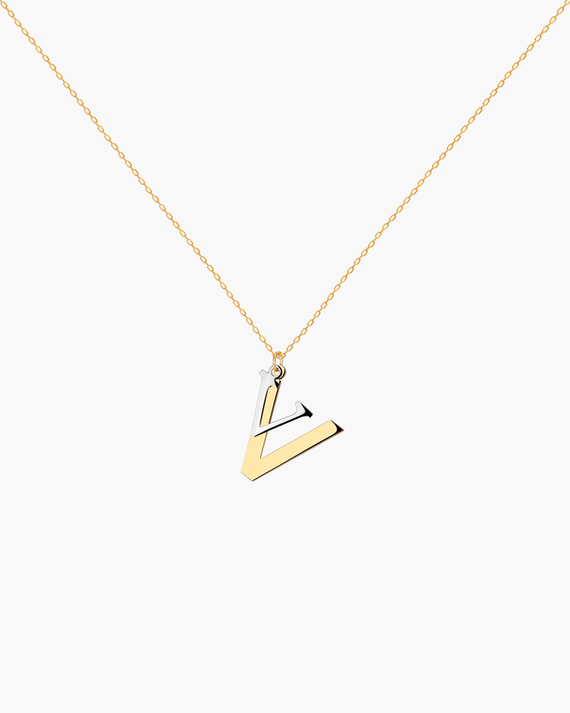 Silver, gold letter necklace letra V